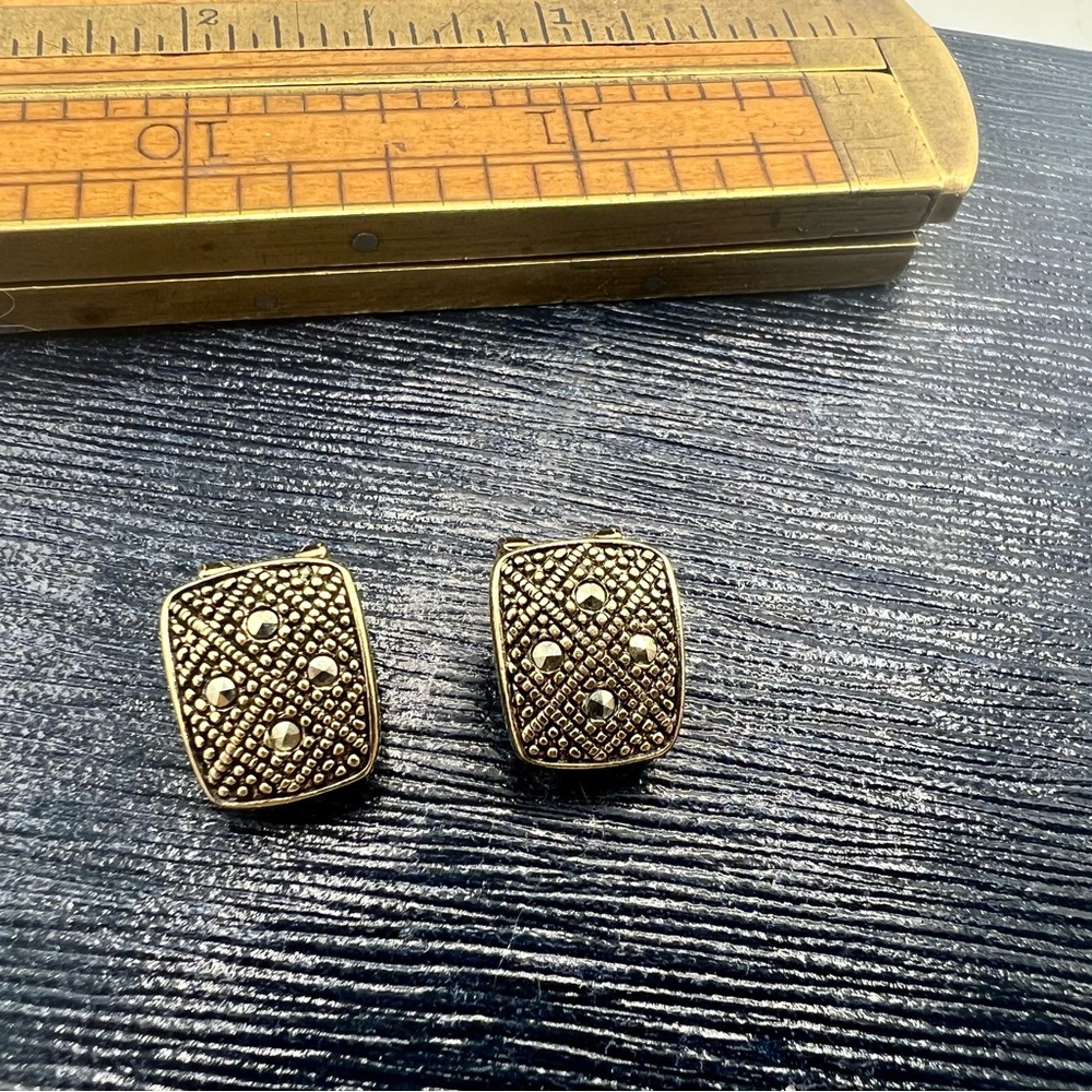Small silver tone clip on LAUREN CONRAD vintage earrings